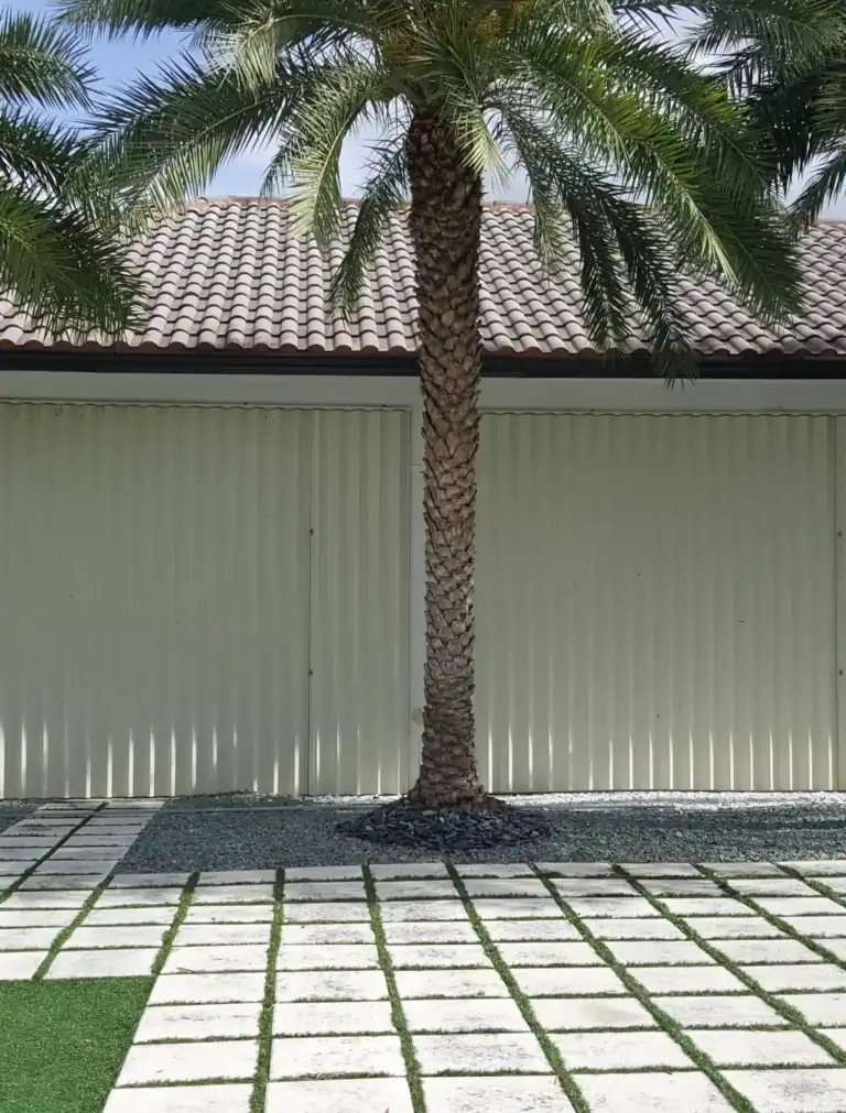 Aluminum accordion shutters providing storm protection for Florida home