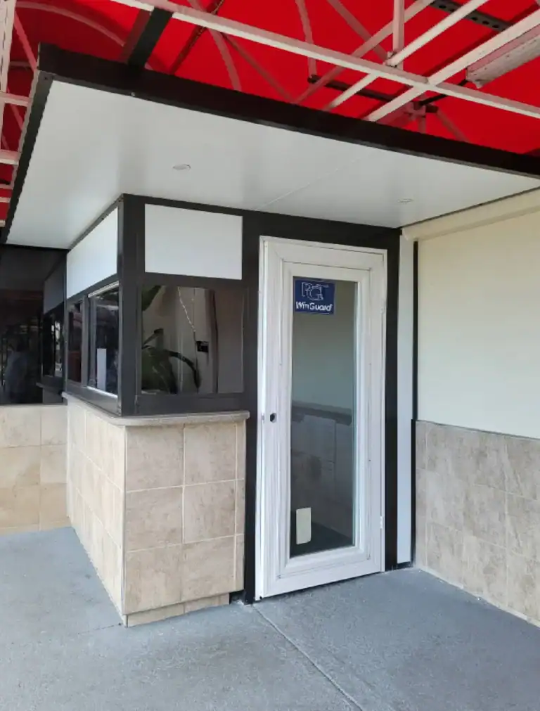 Commercial aluminum structure kiosk with integrated door and service window