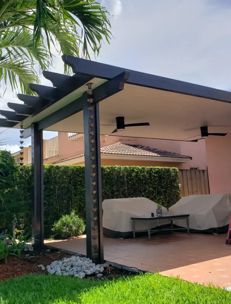 Custom aluminum pergola creating a covered outdoor living space in Florida