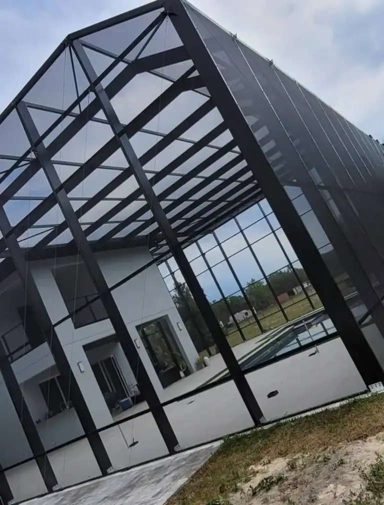 Modern black aluminum screen enclosure with pool in Orlando, Florida