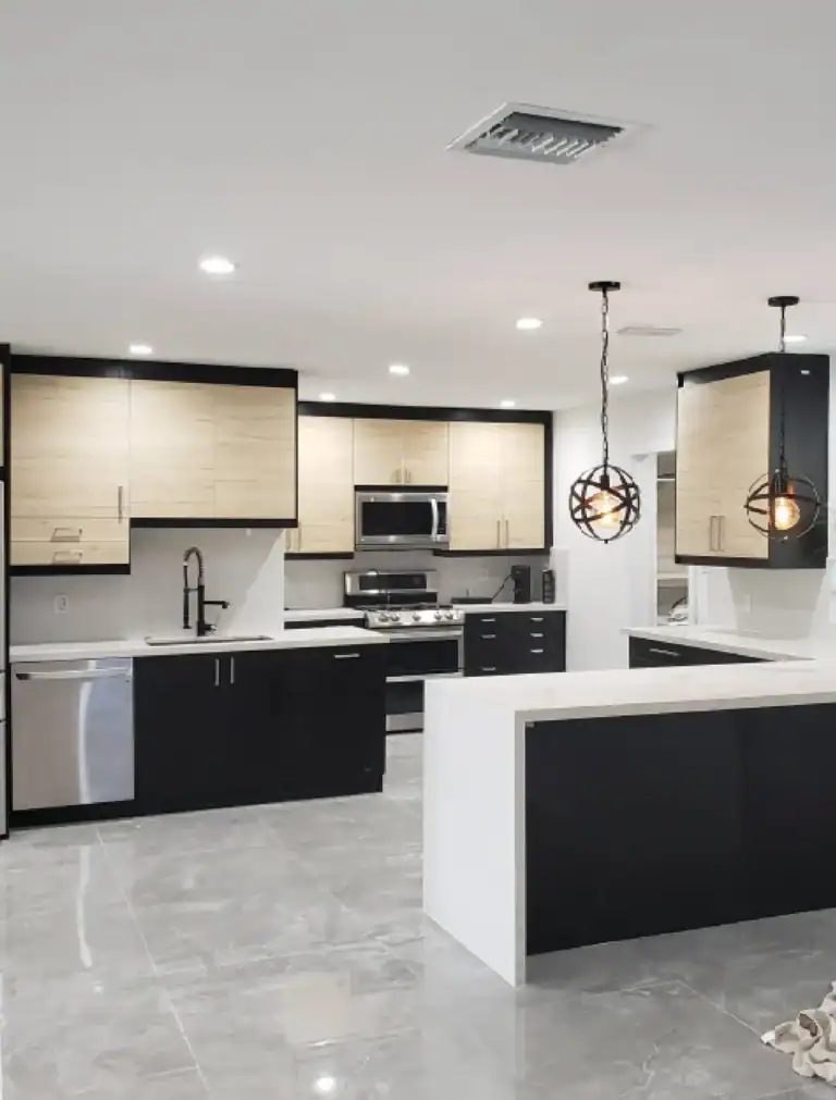 Modern open-concept kitchen renovation with custom cabinets and large island