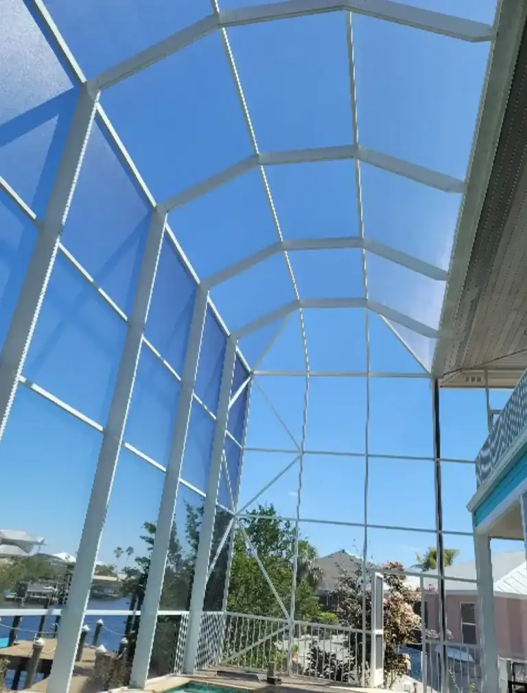 Waterfront aluminum screen enclosure with pool in Cape Coral, Florida